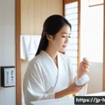 염색 유지 트리트먼트와 헤어팩 차이 - A serene Japanese woman with smooth, freshly dyed hair, gently applying a lightweight treatment to h...